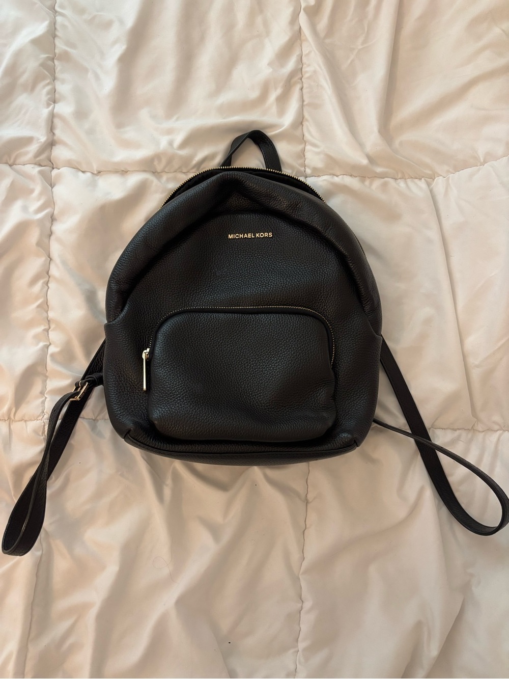 Micheal Kors black leather mini backpack with gold accents